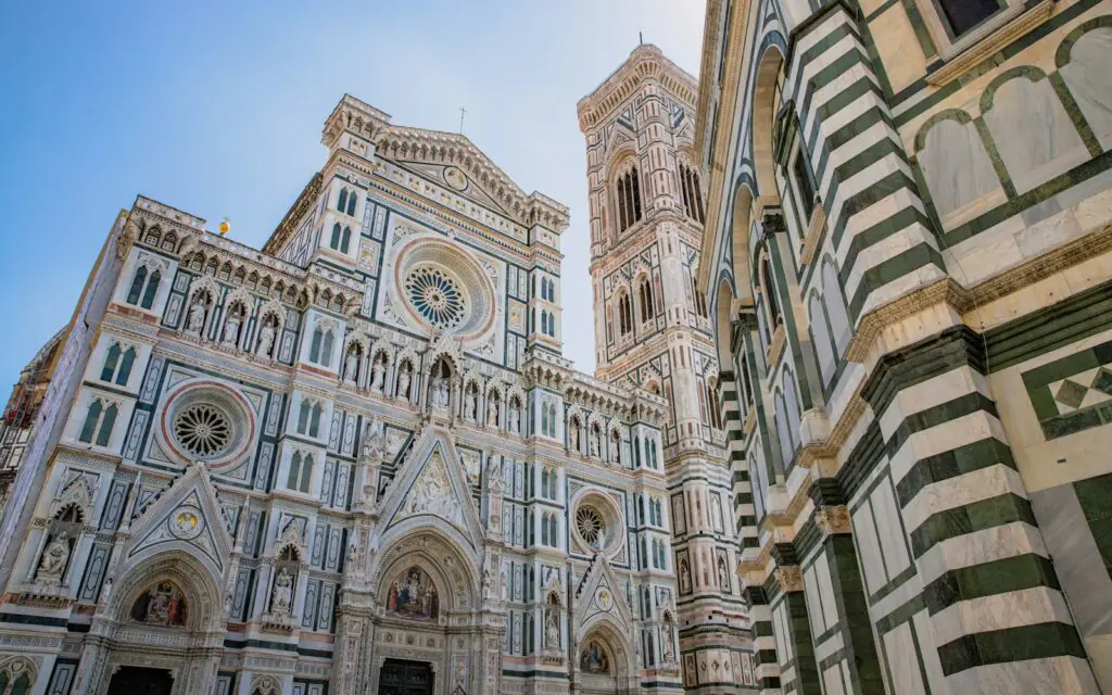 The marble facade of Florence's Duomo with Giotto's Campanile beside it